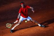 Stefanos Tsitsipas hitting a sliding forehand on clay (Getty Images)